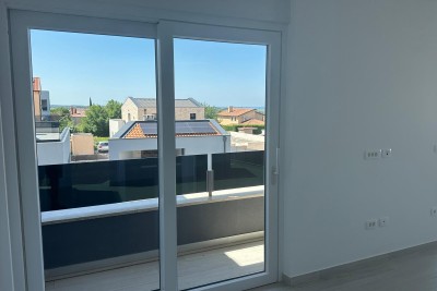 Stanovanje v prvem nadstropju s strešno teraso, Vabriga (S3)